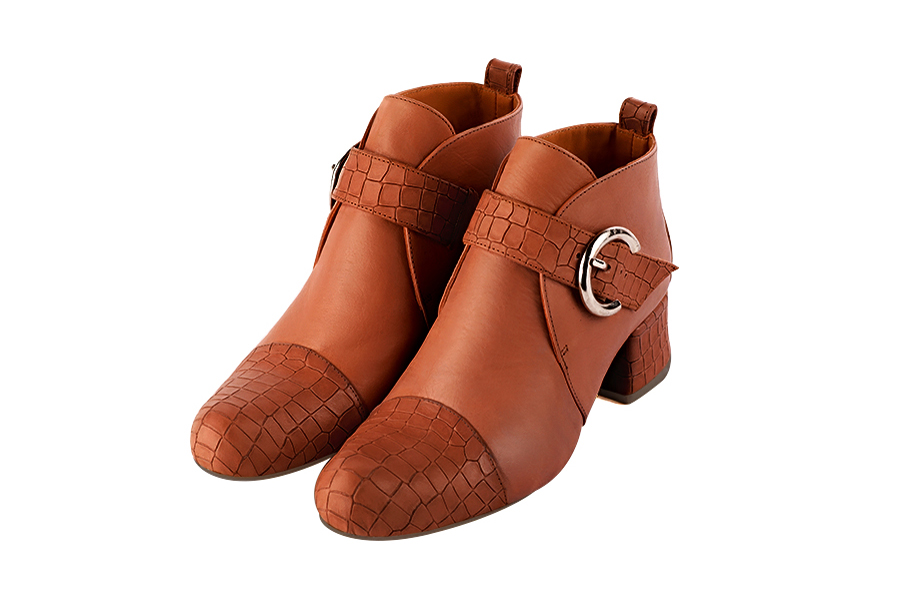 Terracotta orange women's ankle boots with buckles at the front. Round toe. Low flare heels. Front view - Florence KOOIJMAN